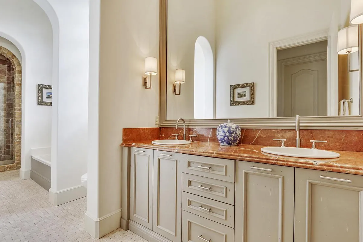 Marble primary bath in Manalapan